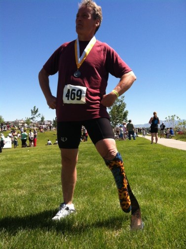 My super man pose after my first (and maybe last) triathlon. You never now what you can do until you try!